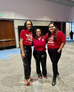 3 former members of Girls Inc. of Lakeland pose for a picture